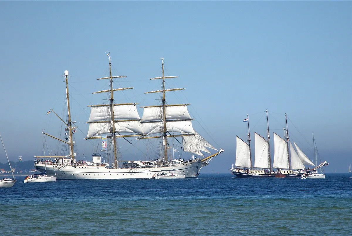 Tall ships and crowds along the Kiel waterfront during Kieler Woche — 2